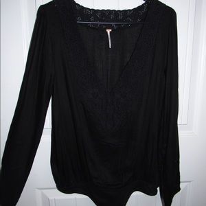 FreePeople black bodysuit.